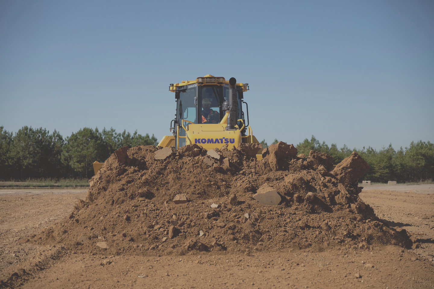 Komatsu D71PXi-24 dozer dirt pile